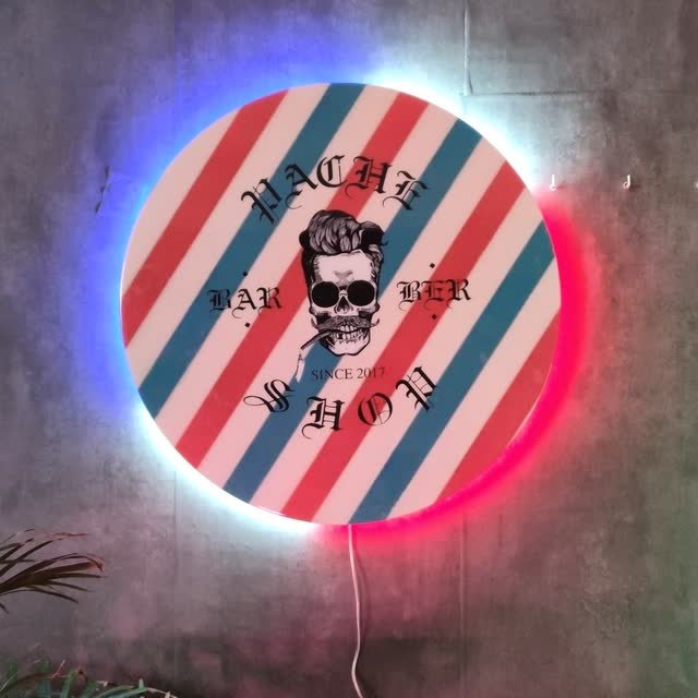 Rótulo circular de neón LED con el poste clásico de barbería