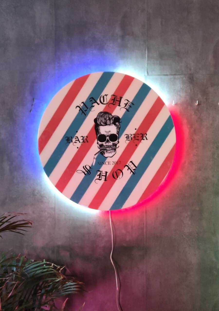 Rótulo circular de neón LED con el poste clásico de barbería