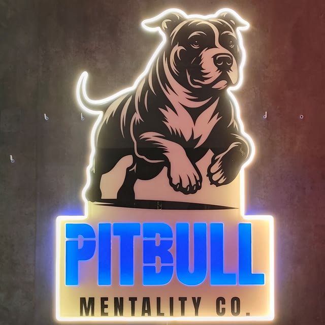 Silueta de perro estilo logo con nombre en neón LED